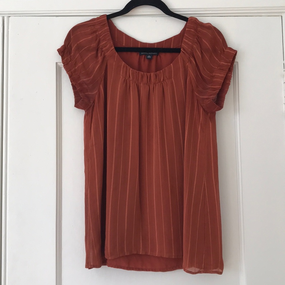 Orange striped blouse